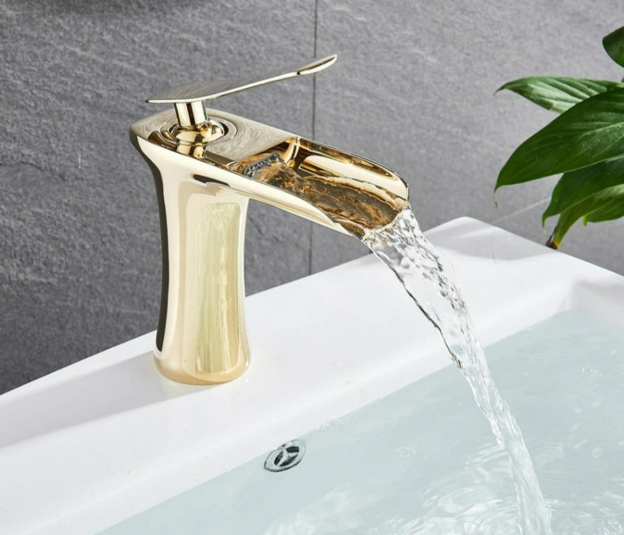 Polished gold waterfall bathroom faucet