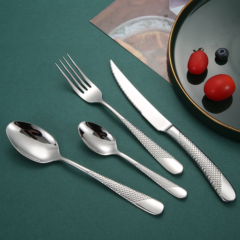 silver flatware set with textured handles
