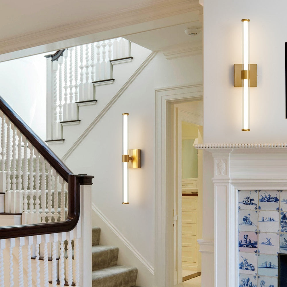 gold finish two-bulb wall sconce for stairway