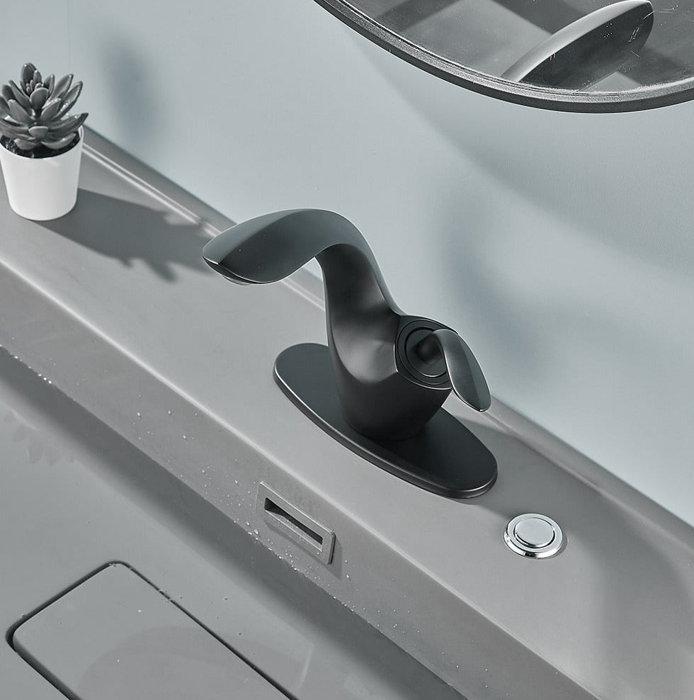 black curved modern master bathroom faucet