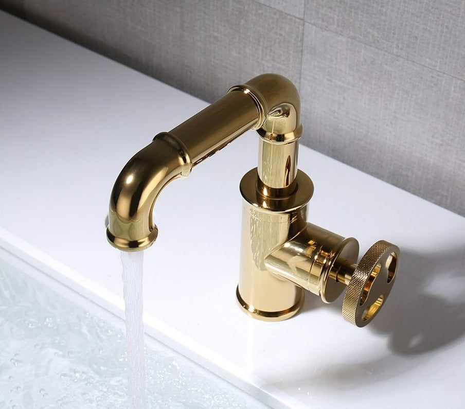 Polished industrial themed bathroom faucet