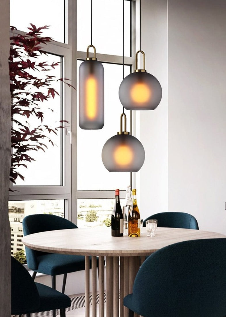 Soft Gray frosted Glass hanging Pendant Lights. Modern style available in globe or oblong shape