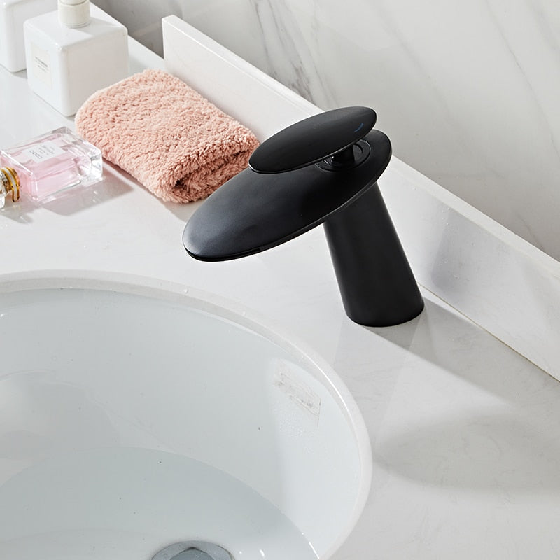 flat curved modern waterfall faucet