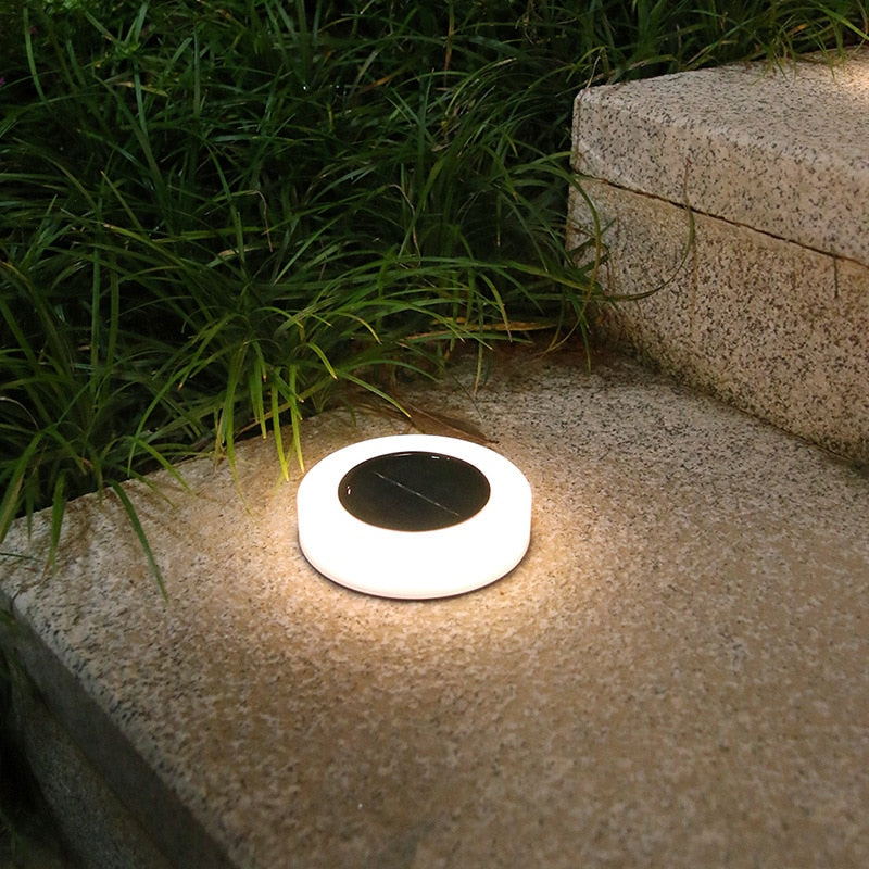 Luces LED solares de disco para caminos