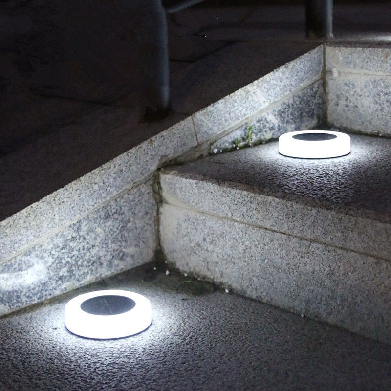 Luces LED solares de disco para caminos
