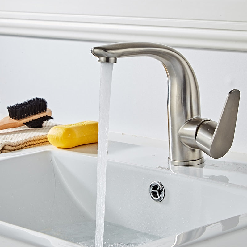Modern curved brushed nickel bathroom faucet