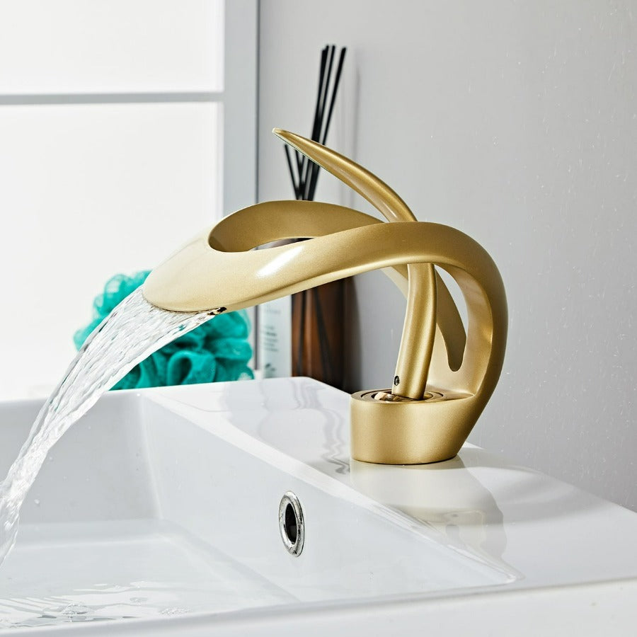 Modern curved elegant polished gold bathroom basin faucet