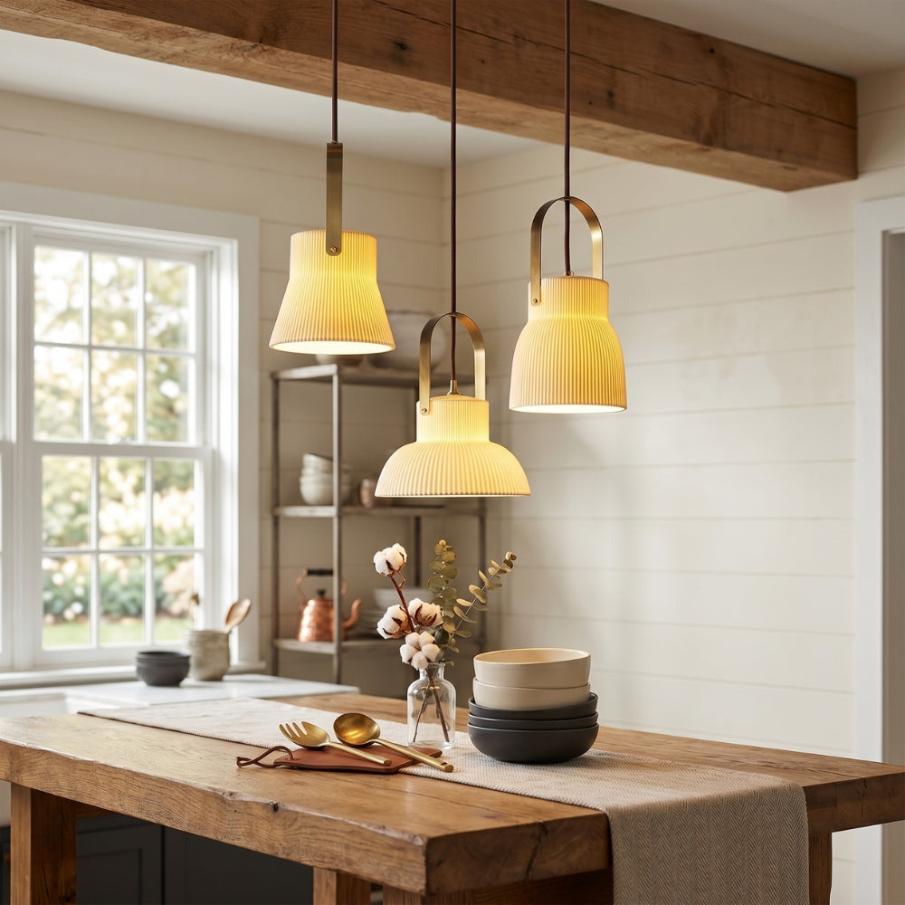 Dining room with wooden table, pendant lights, and a window.