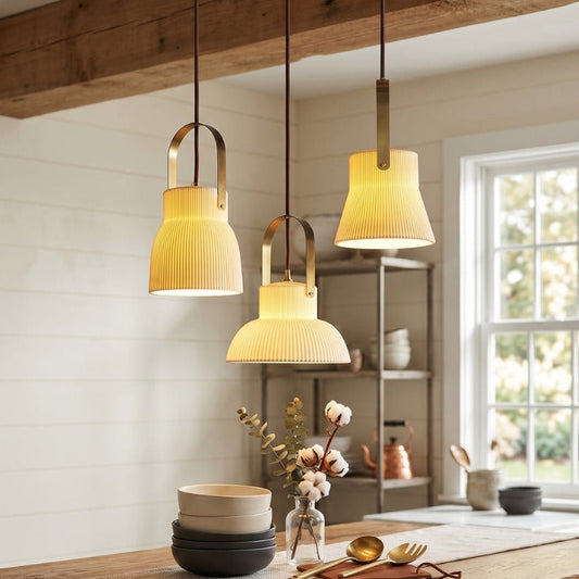 Dining room with wooden table, pendant lights, and a window.