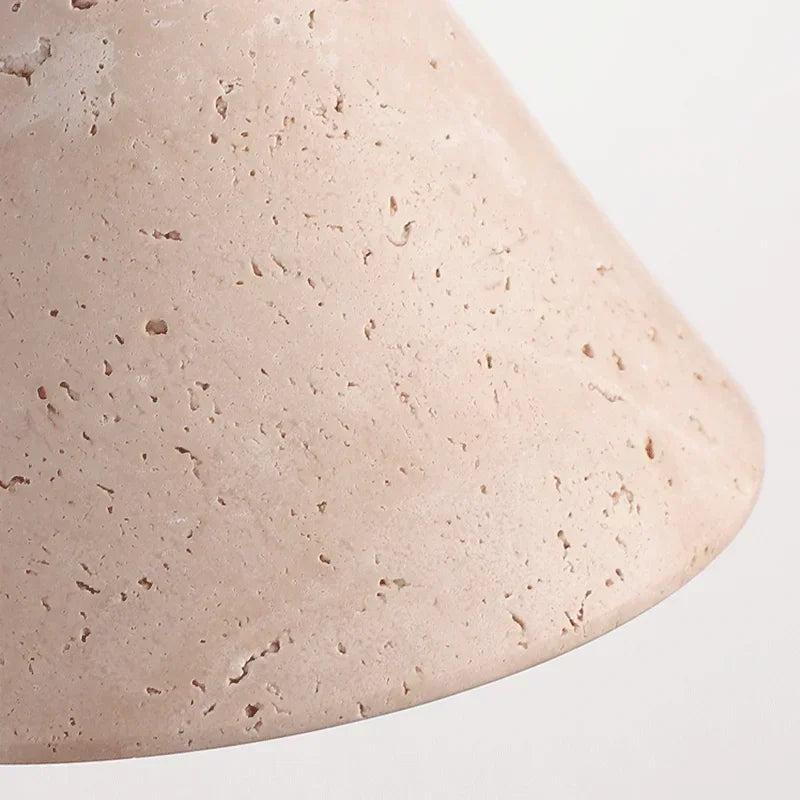 Close-up of a beige stone surface with natural texture