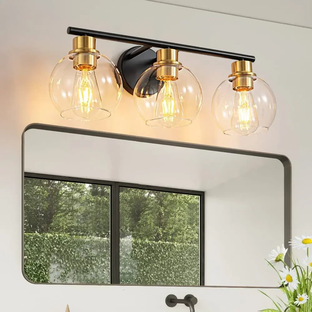 three bulb black and gold finish vanity light