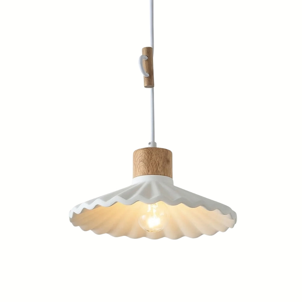 Pendant light with wooden base and white ceramic shade on a white background