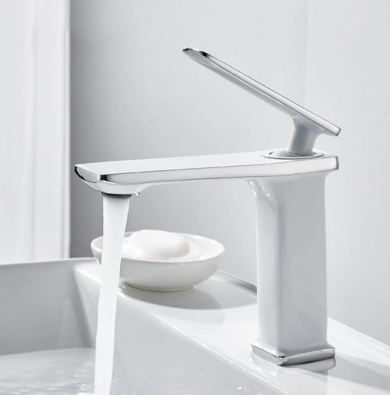 Modern white and chrome bathroom faucet