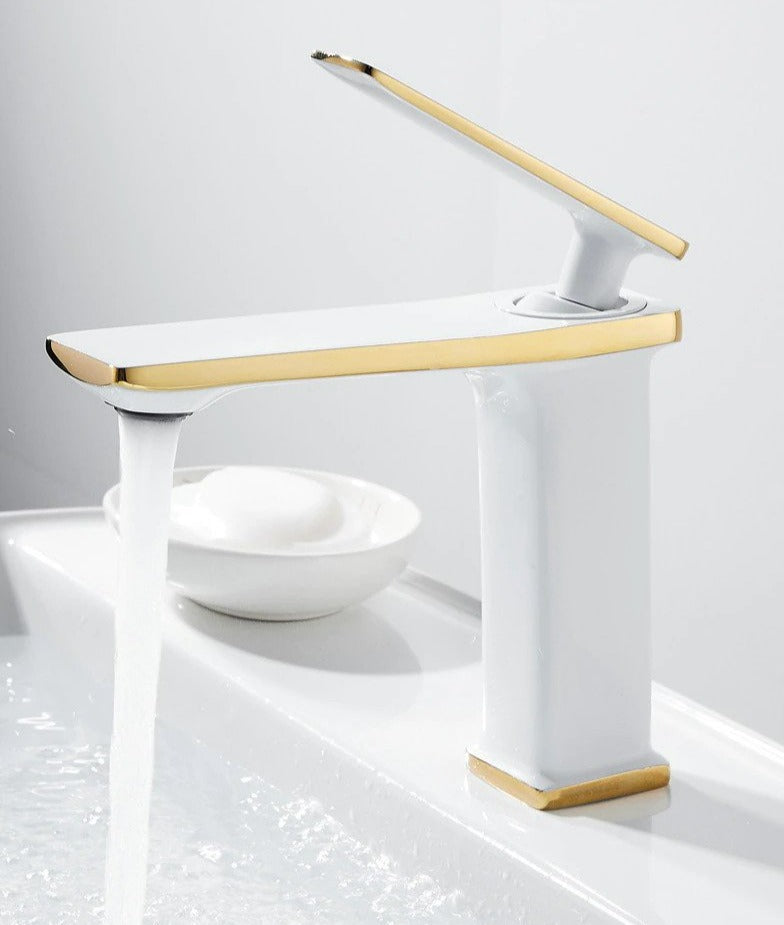 Modern white and gold bathroom faucet