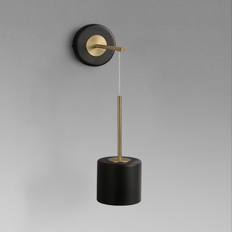 Corbin black and brass modern wall sconce