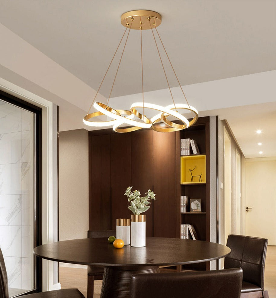 Polished gold unique modern ribbon chandelier for kitchens and dining rooms