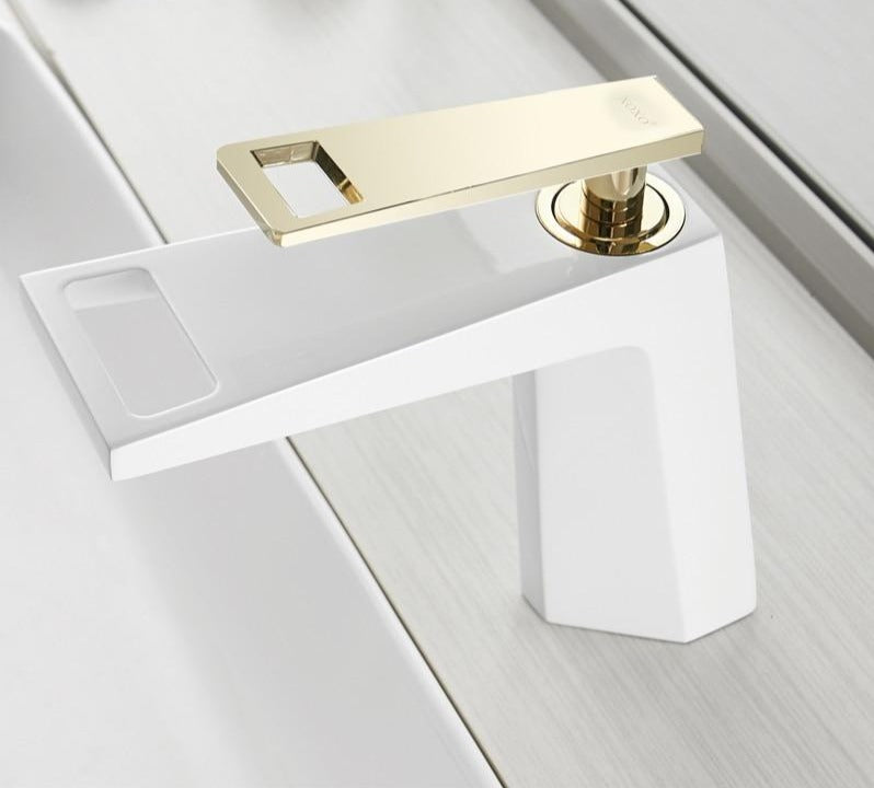 Modern white and polished gold bathroom faucet