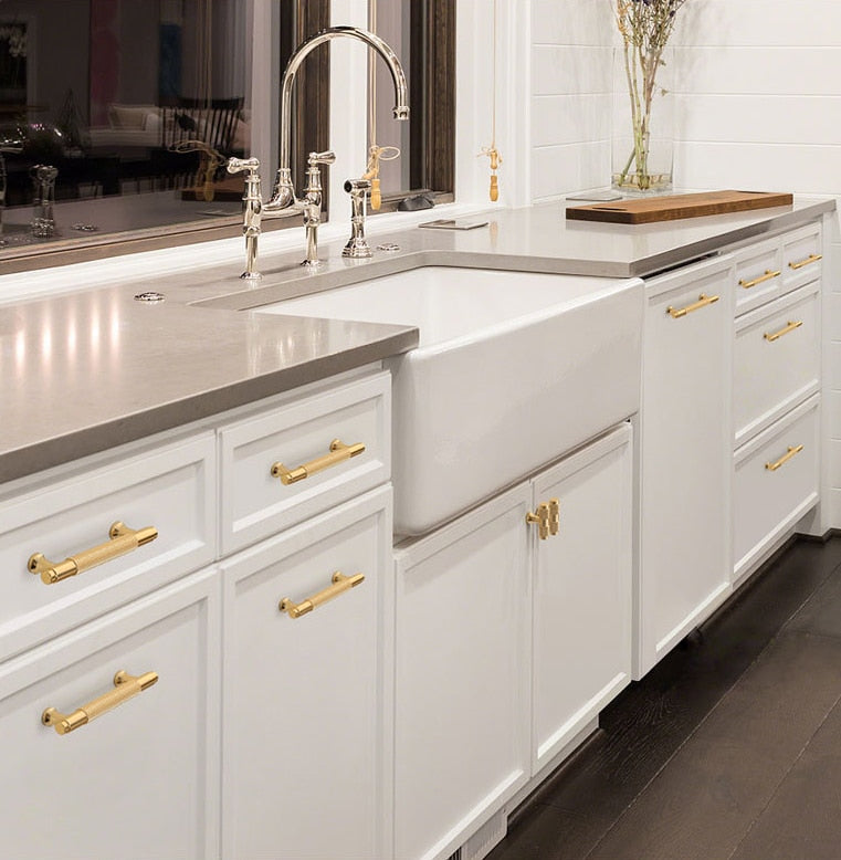 Gold cabinet and drawer handles for kitchens