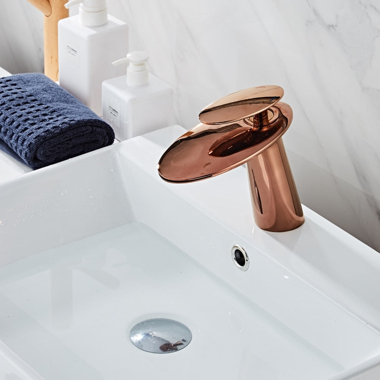 Modern rose gold waterfall faucet