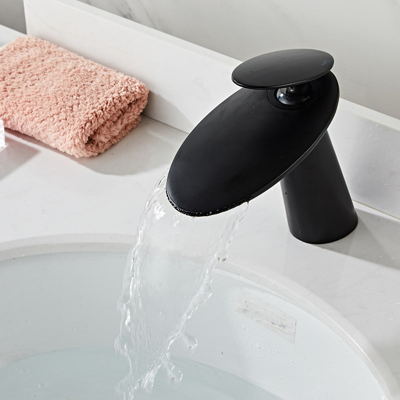 Curved black modern waterfall faucet