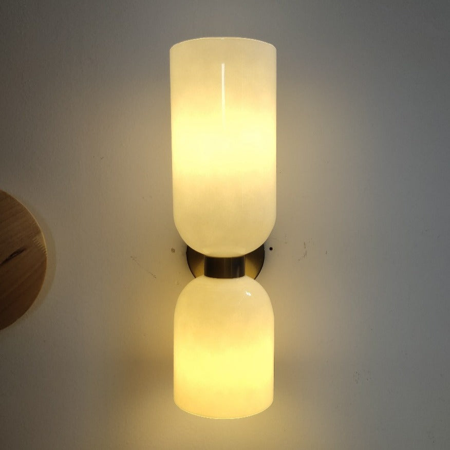 Modern glass wall sconce in white